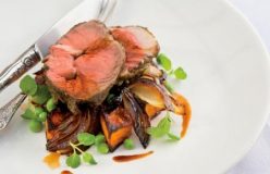 Roast spring leg of lamb with roast pumpkin, pea and mint salad